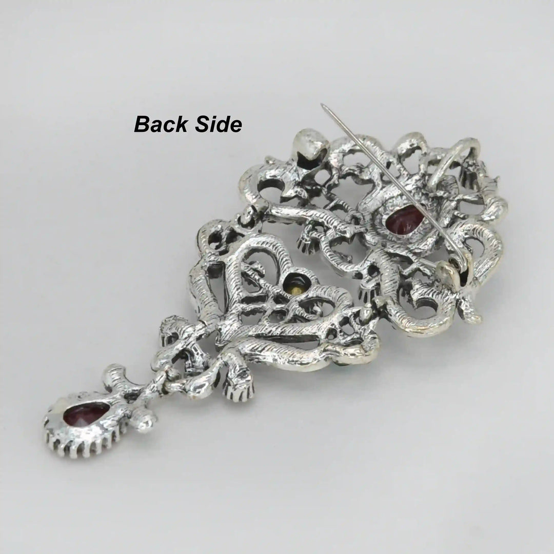 ANI Accessories royal heirloom crystal brooch back side showing the pin 