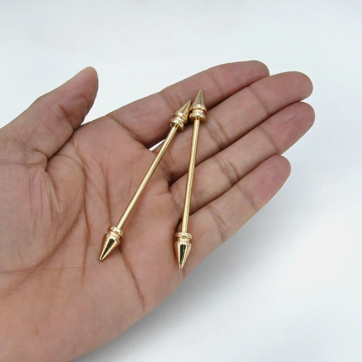 ANI Accessories gold shirt collar pin for men held in hand to show its length 