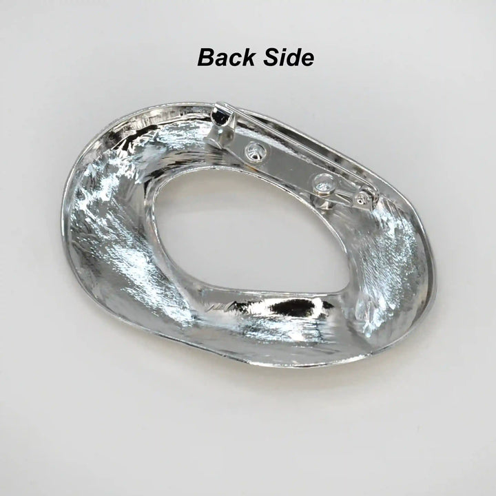 ANI Accessories silver abstract brooch back side showing the pin 