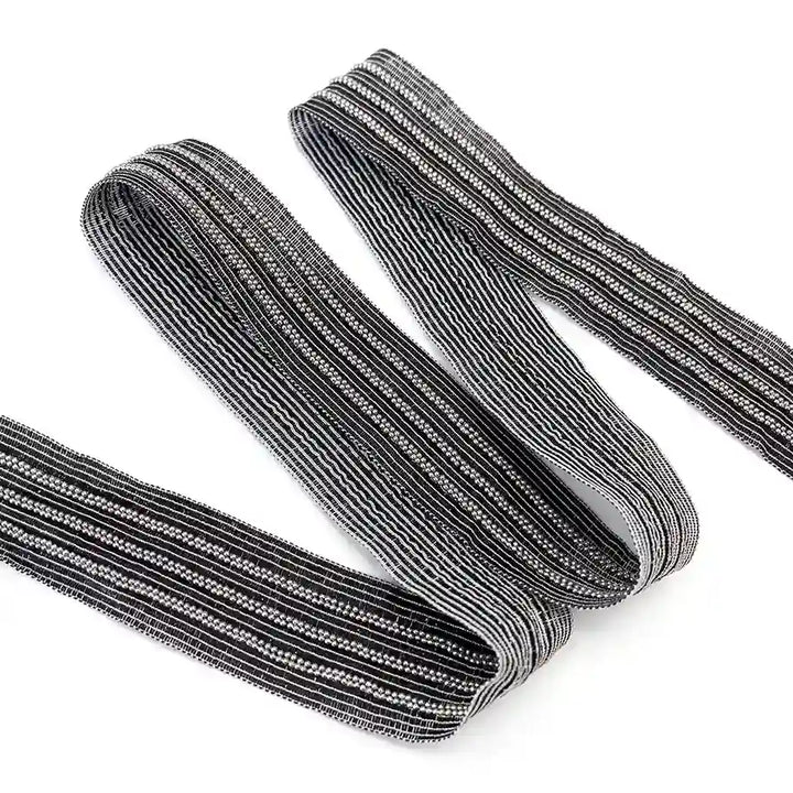 ANI Accessories silver beaded lace trim with three bead rows, folded in a zigzag with white color background 