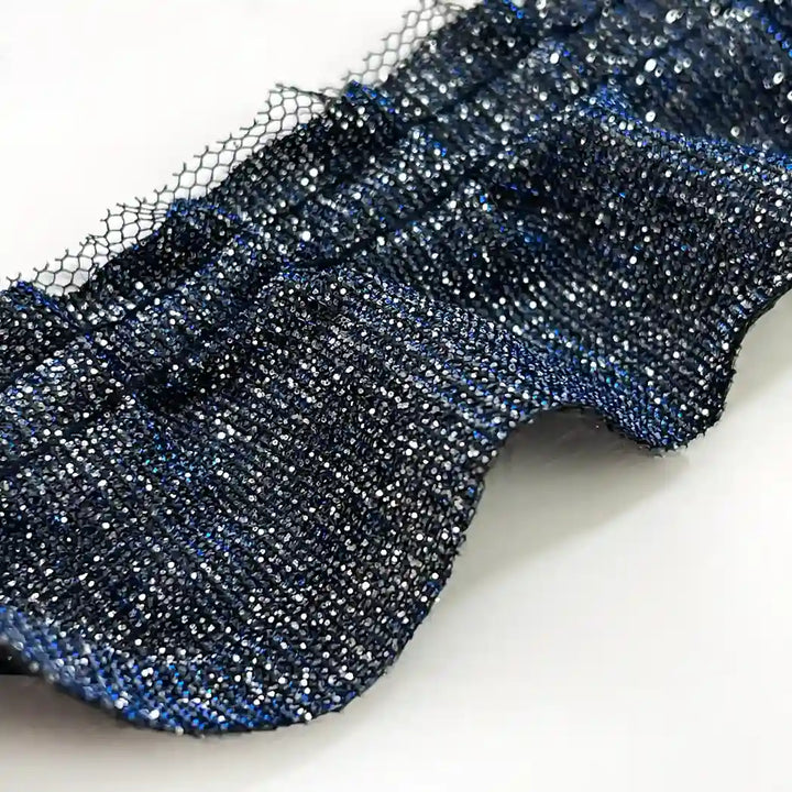 ANI Accessories close-up of silver lurex shimmer on navy ruffle lace with white color background 