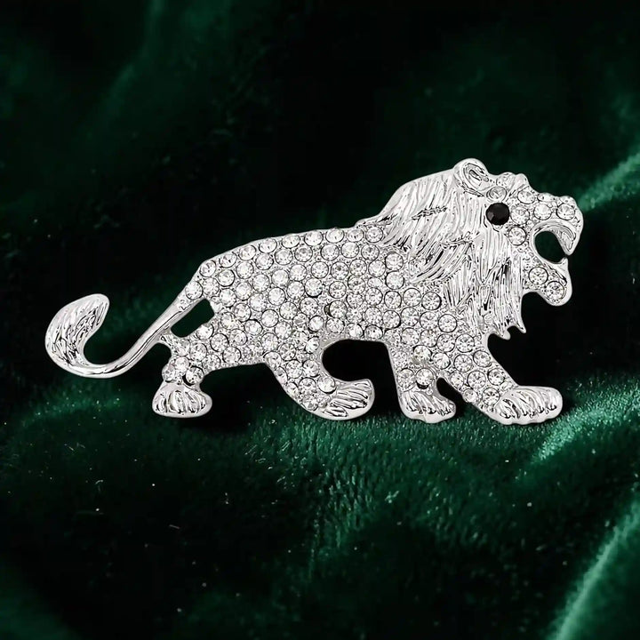 ANI Accessories silver rhinestone lion brooch for men on dark green velvet 