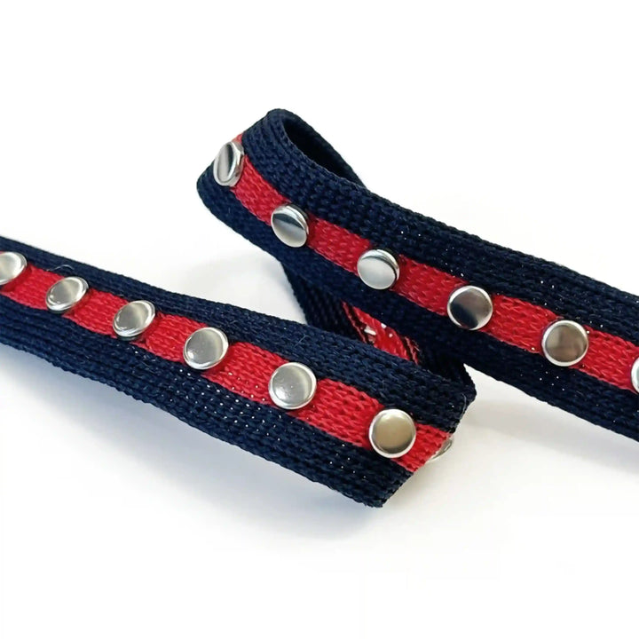 ANI Accessories close-up of silver studs on navy and red stripe tape with white color background 