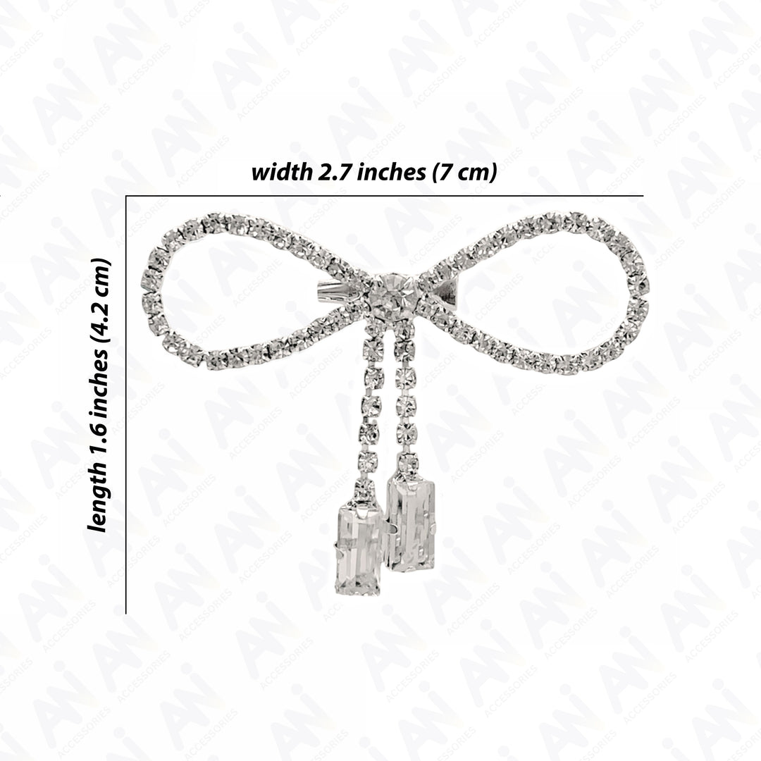 Sparkling Bow Brooch with Hanging Sapphire Two Stone featuring a glittering bow design and elegant dangling stones