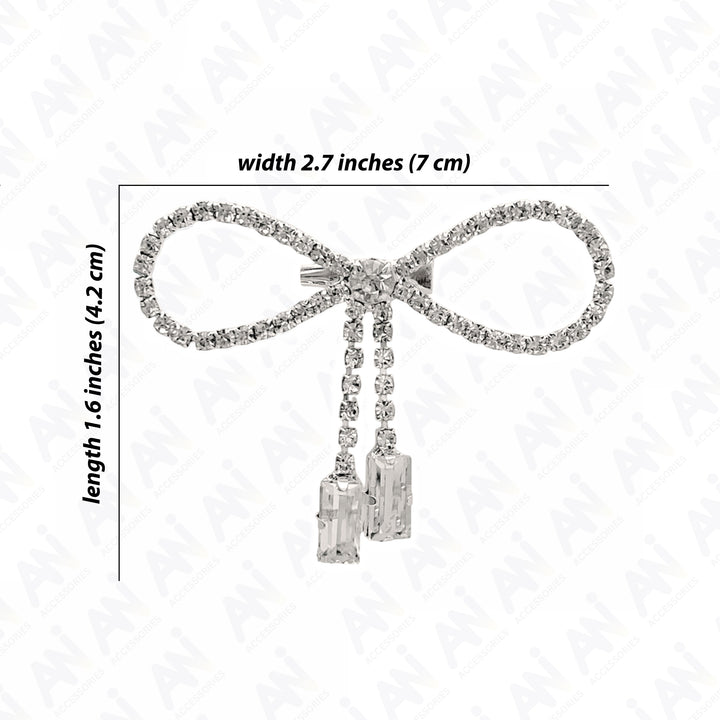 Sparkling Bow Brooch with Hanging Sapphire Two Stone featuring a glittering bow design and elegant dangling stones