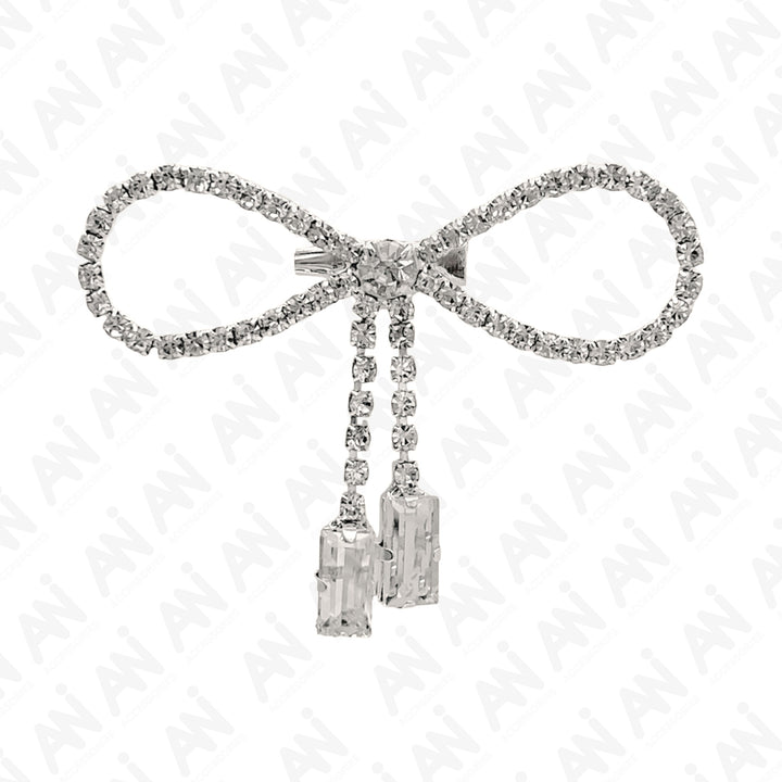 Sparkling Bow Brooch with Hanging Sapphire Two Stone, featuring shimmering crystals and elegant design