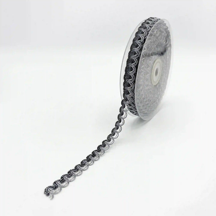 ANI Accessories thin silver zari lace on a roll with white color background 