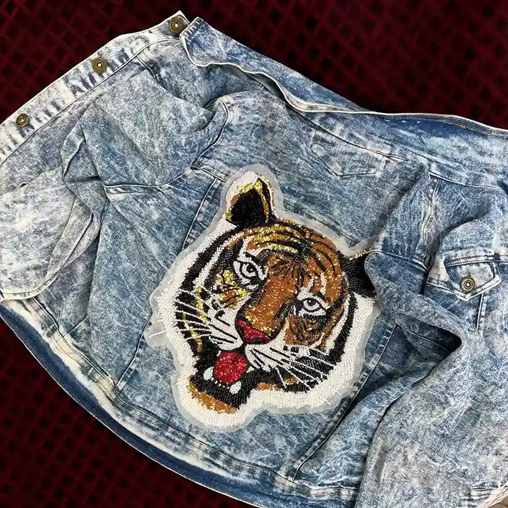 Tiger's Roar Beaded Sew Patch for Denim, Shirt & More on a distressed denim jacket