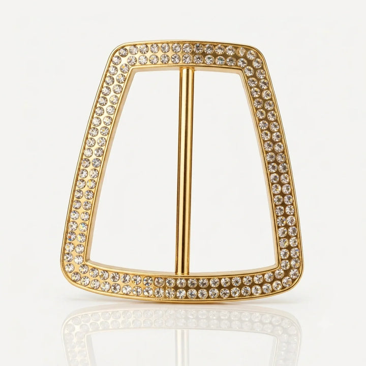 ANI Accessories trapezoid gold belt buckle with double-row pave rhinestones and central bar, front view on white with reflection