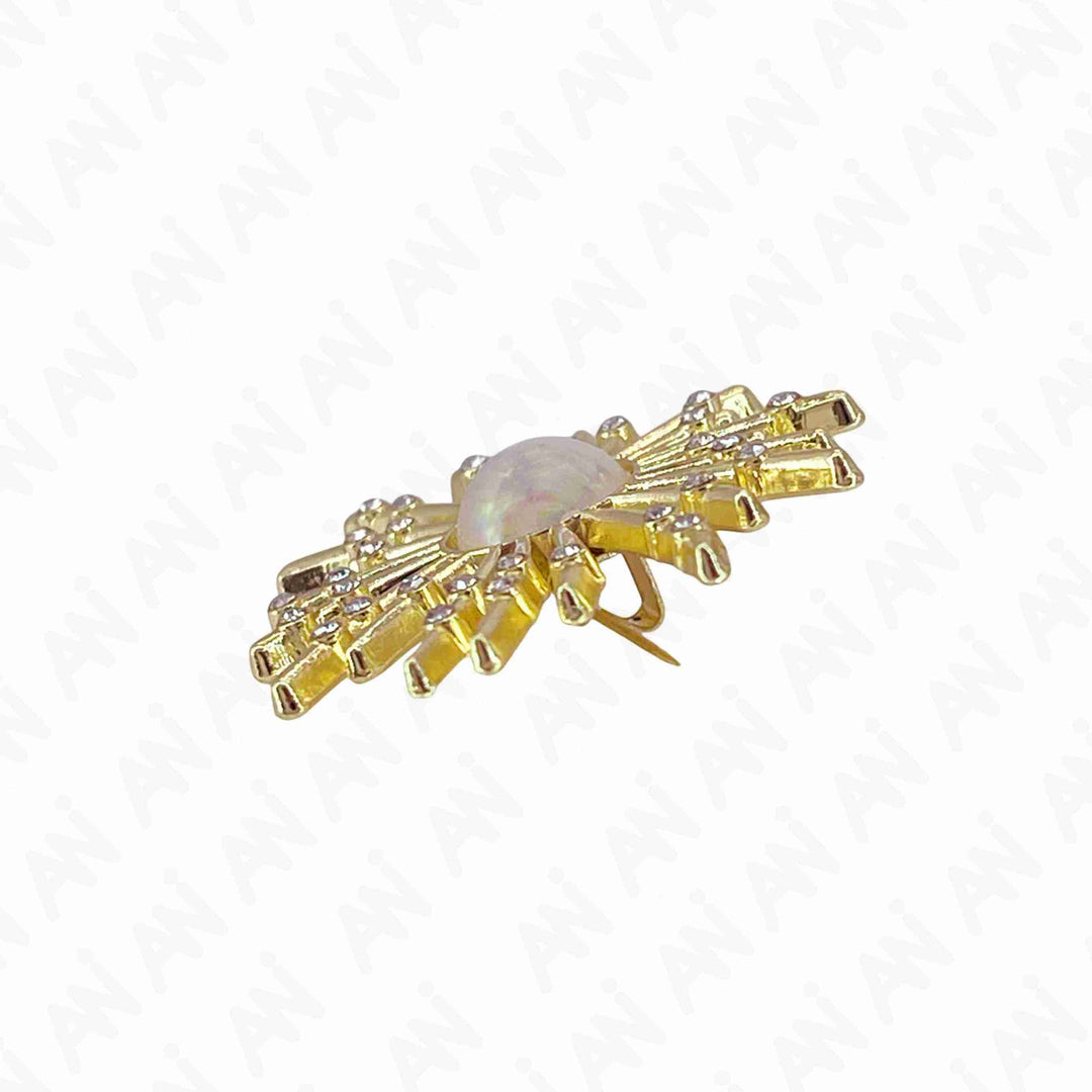 Elegant gold floral pearl brooch for sarees & outfits with intricate design and shimmering details