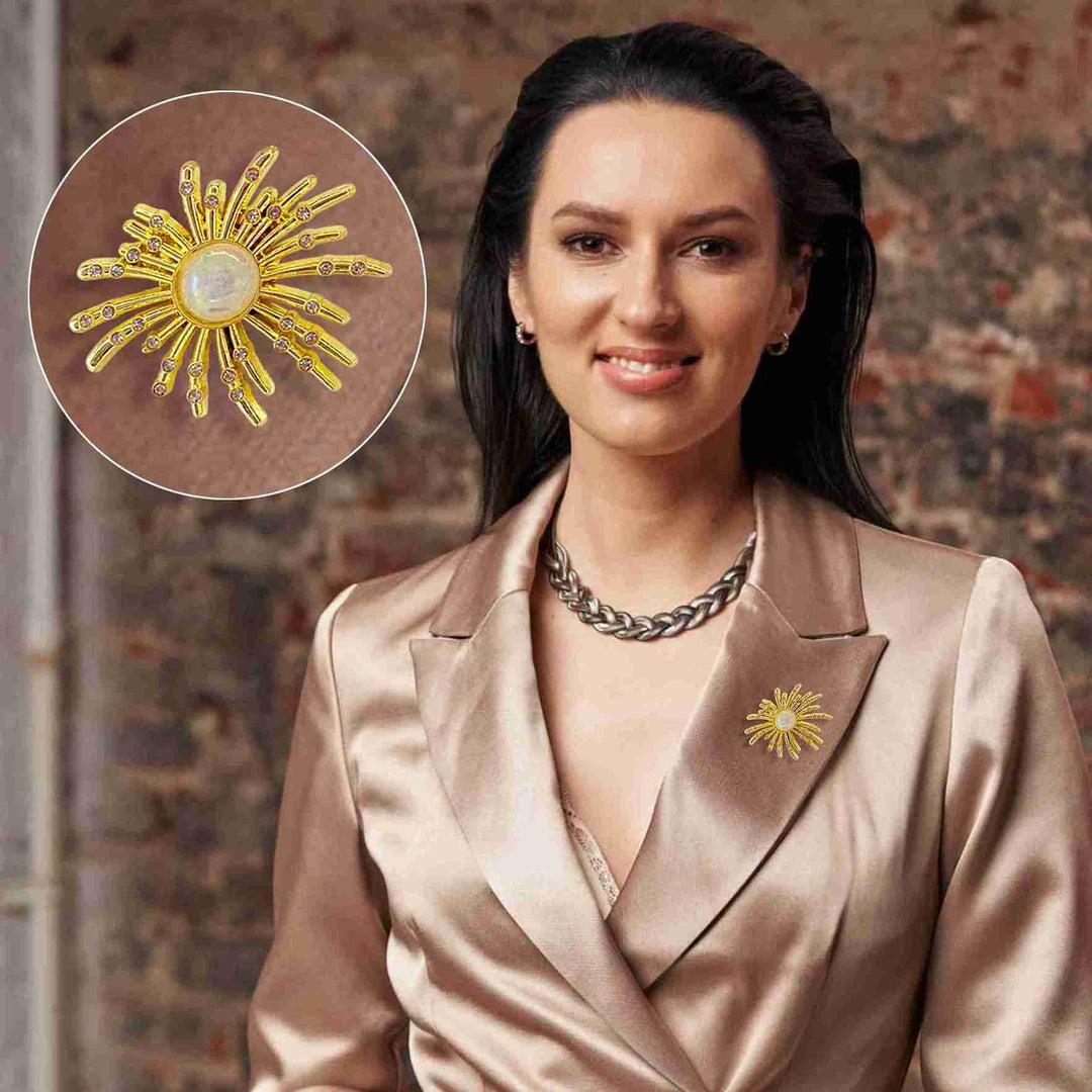 Elegant floral pearl brooch for sarees & outfits featuring a unique starburst design in gold tone