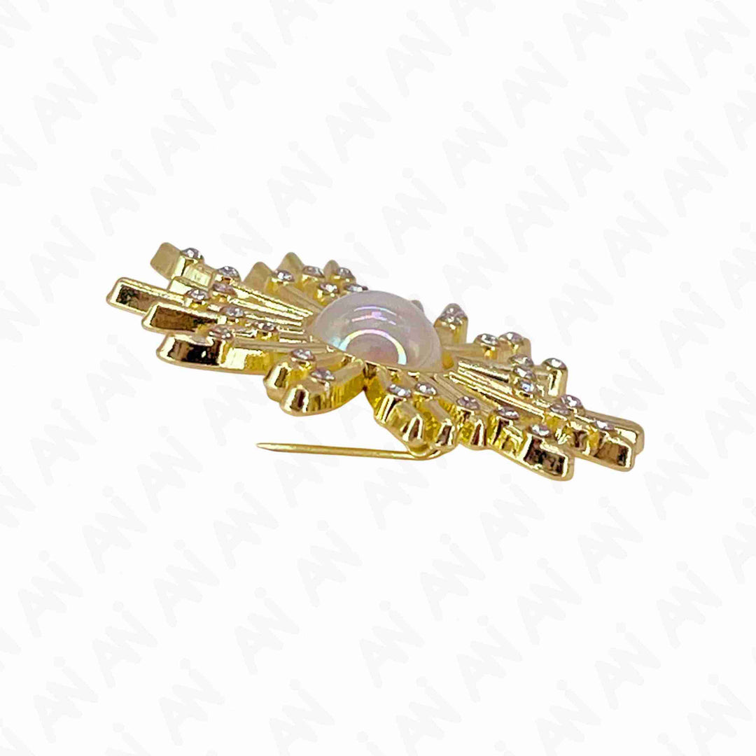 Elegant gold floral pearl brooch for sarees & outfits featuring intricate detailing and a central pearl