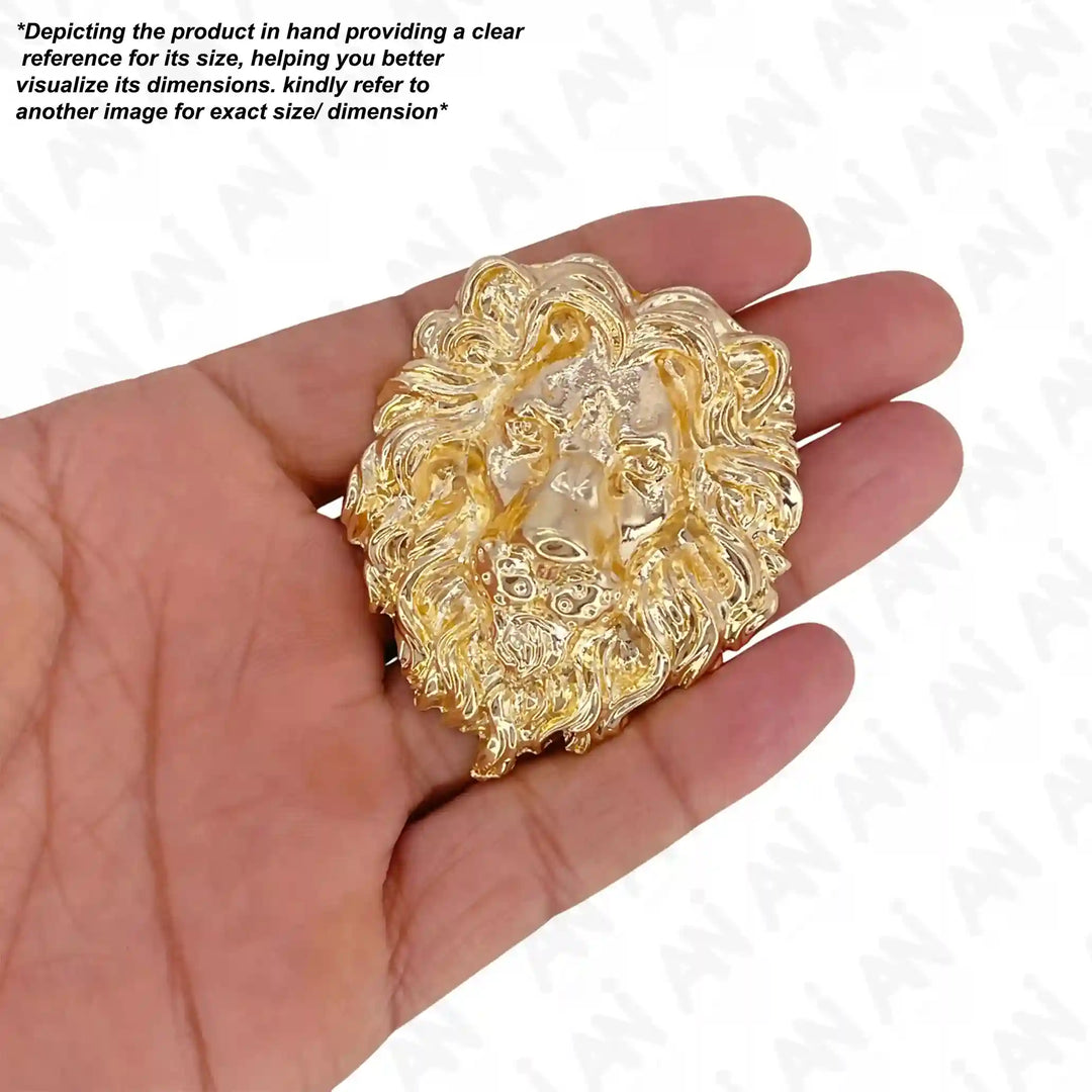 Gold lion brooch displayed in hand showcasing intricate details and craftsmanship
