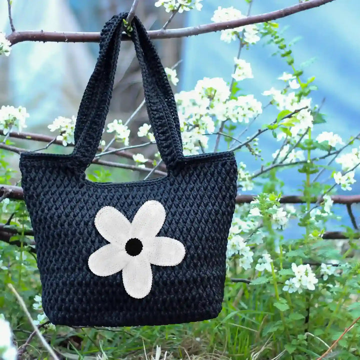 ANI Accessories white daisy flower patch for bags on a dark crochet tote bag 
