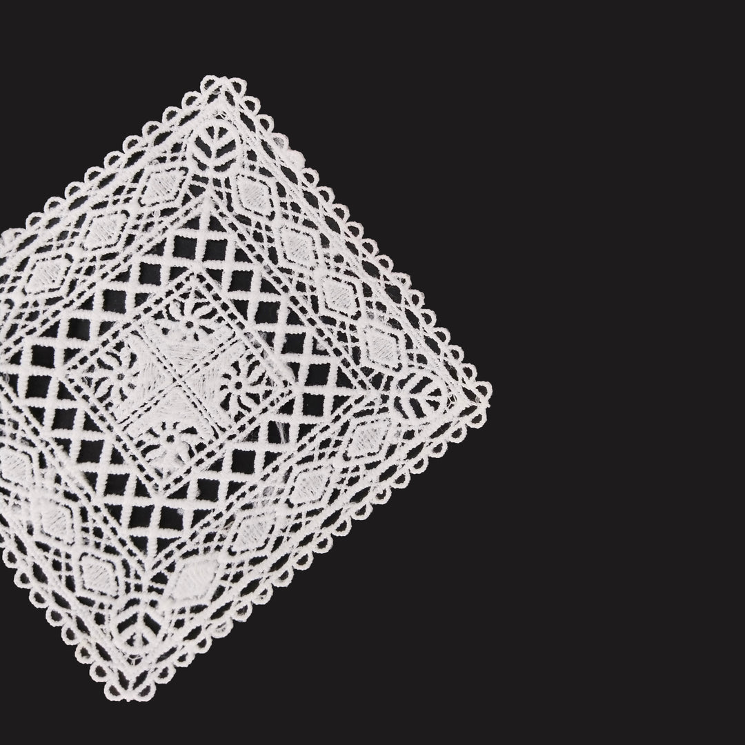 ANI Accessories white diamond guipure lace patch in spun poly with scalloped edge, on black background 