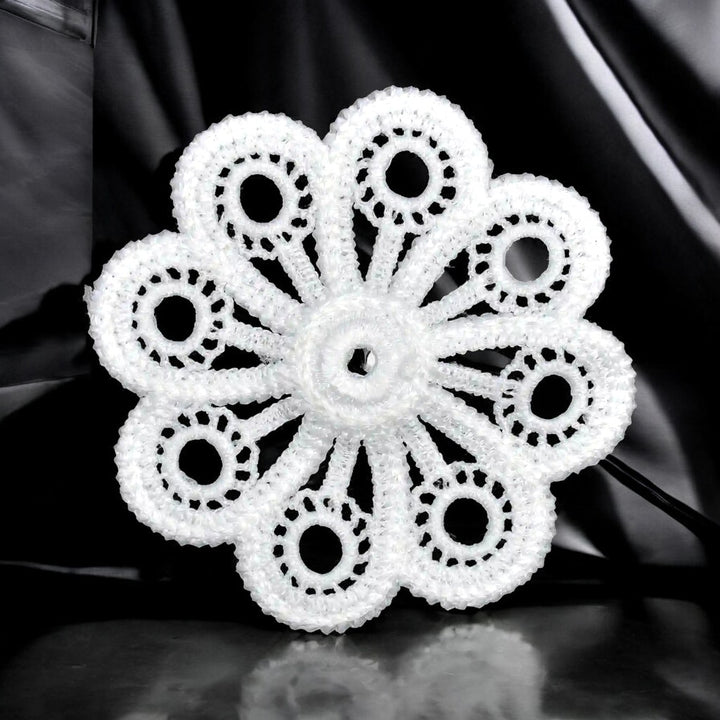 ANI Accessories white eyelet flower guipure lace patch in spun poly, on black fabric 