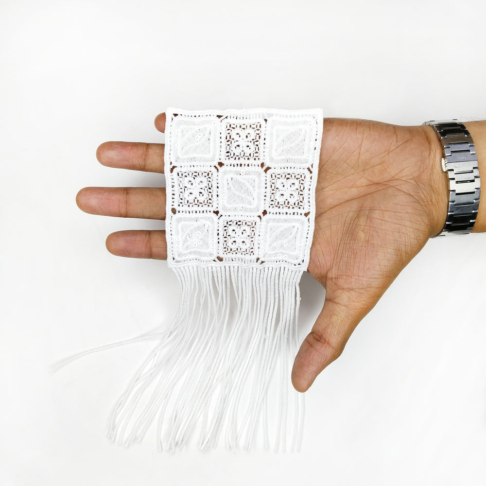 ANI Accessories white fringe patch draped over a hand to show the panel and fringe length 