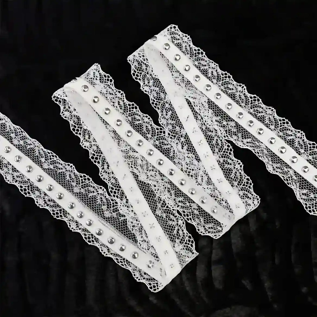 ANI Accessories white scallop studded metal eyelet lace, 3.5 cm, folded in a zigzag with black color background 
