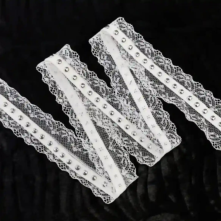 ANI Accessories white scallop studded metal eyelet lace, 3.5 cm, folded in a zigzag with black color background 