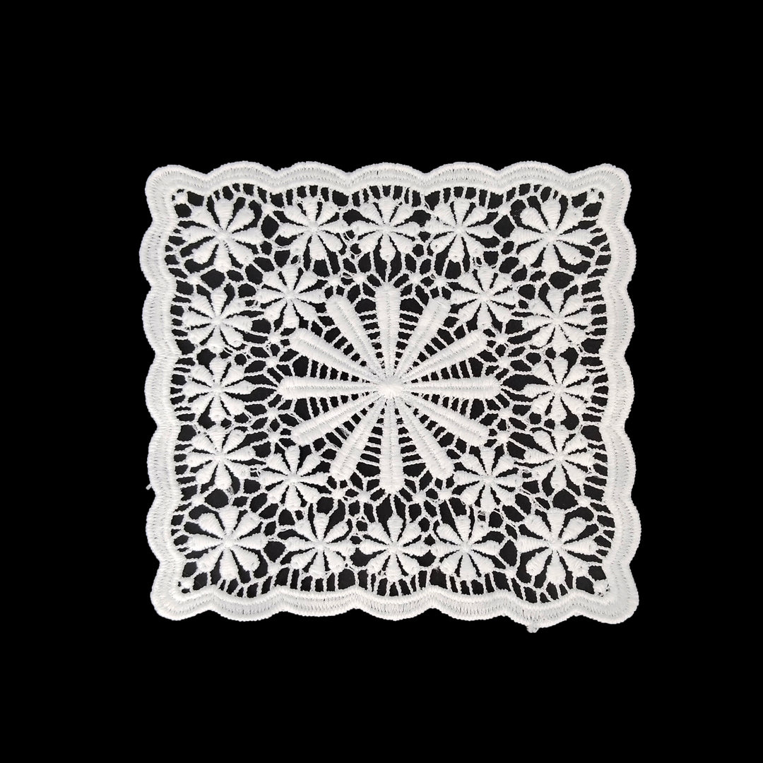 ANI Accessories white starburst guipure lace patch in spun poly with a large centre flower, on black 