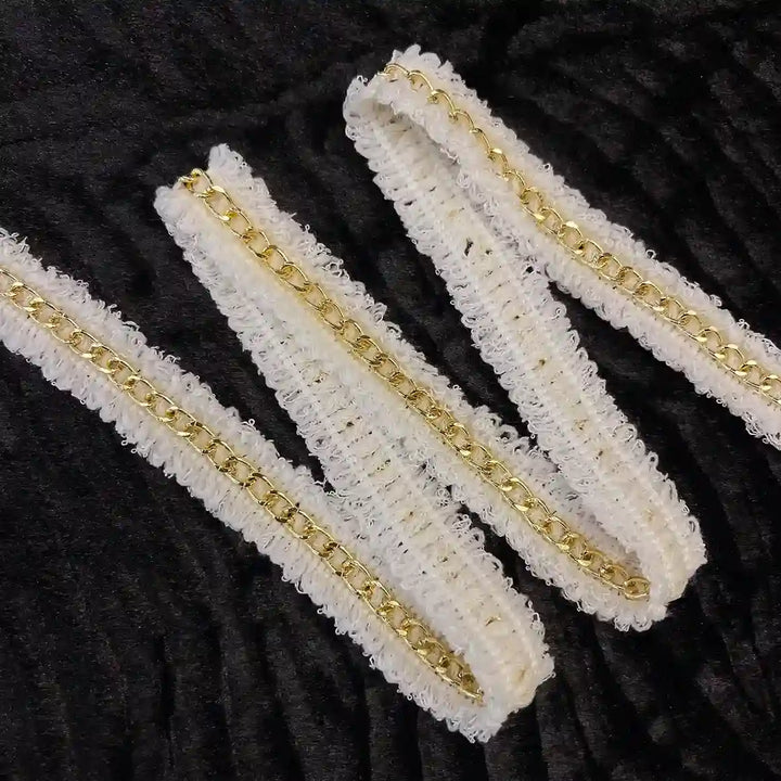 ANI Accessories white tweed trim with gold chain folded in a zigzag 