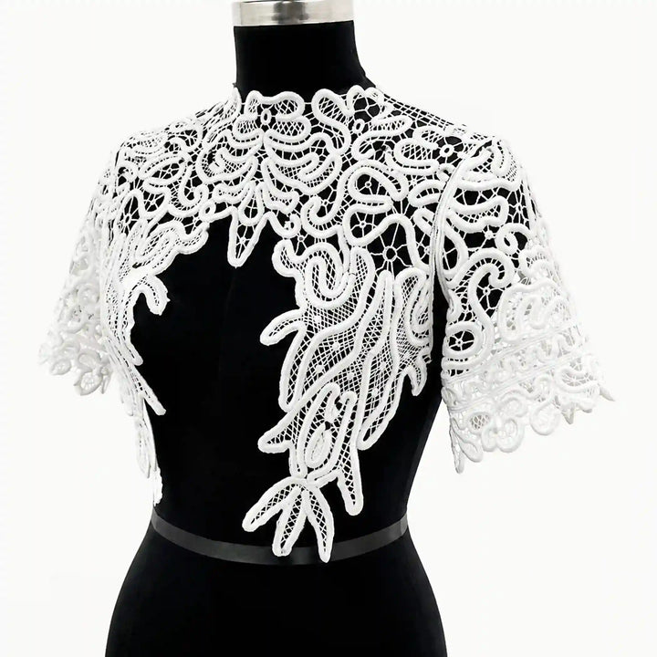 ANI Accessories white Venice lace yoke with collar and flutter sleeves over a black bodice on a dress form 