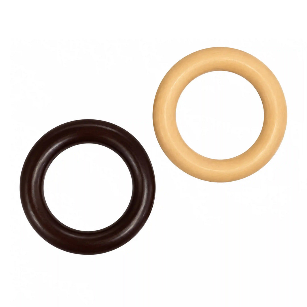 ANI Accessories walnut brown and natural wooden O-ring buckles lying side by side, angled view on white background 